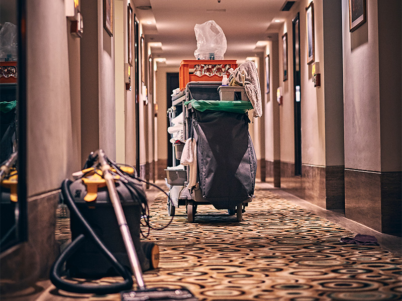 ashwini-chaudhary-Iu6parQAO-U-unsplash_4x3 Cleaning cart in a hotel hallway